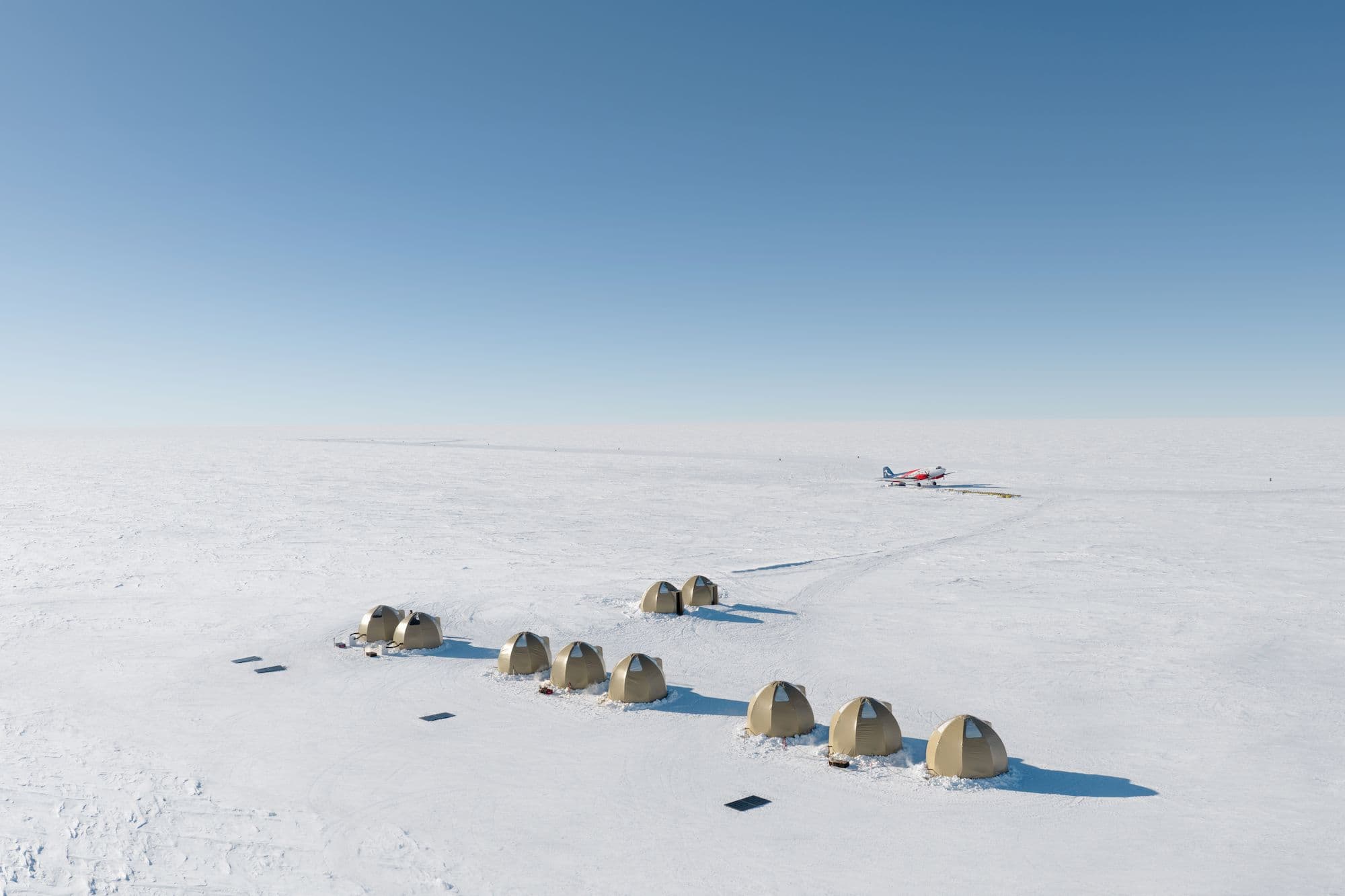 Fly into Dixies Camp, and return later to overnight at the High Polar Plateau